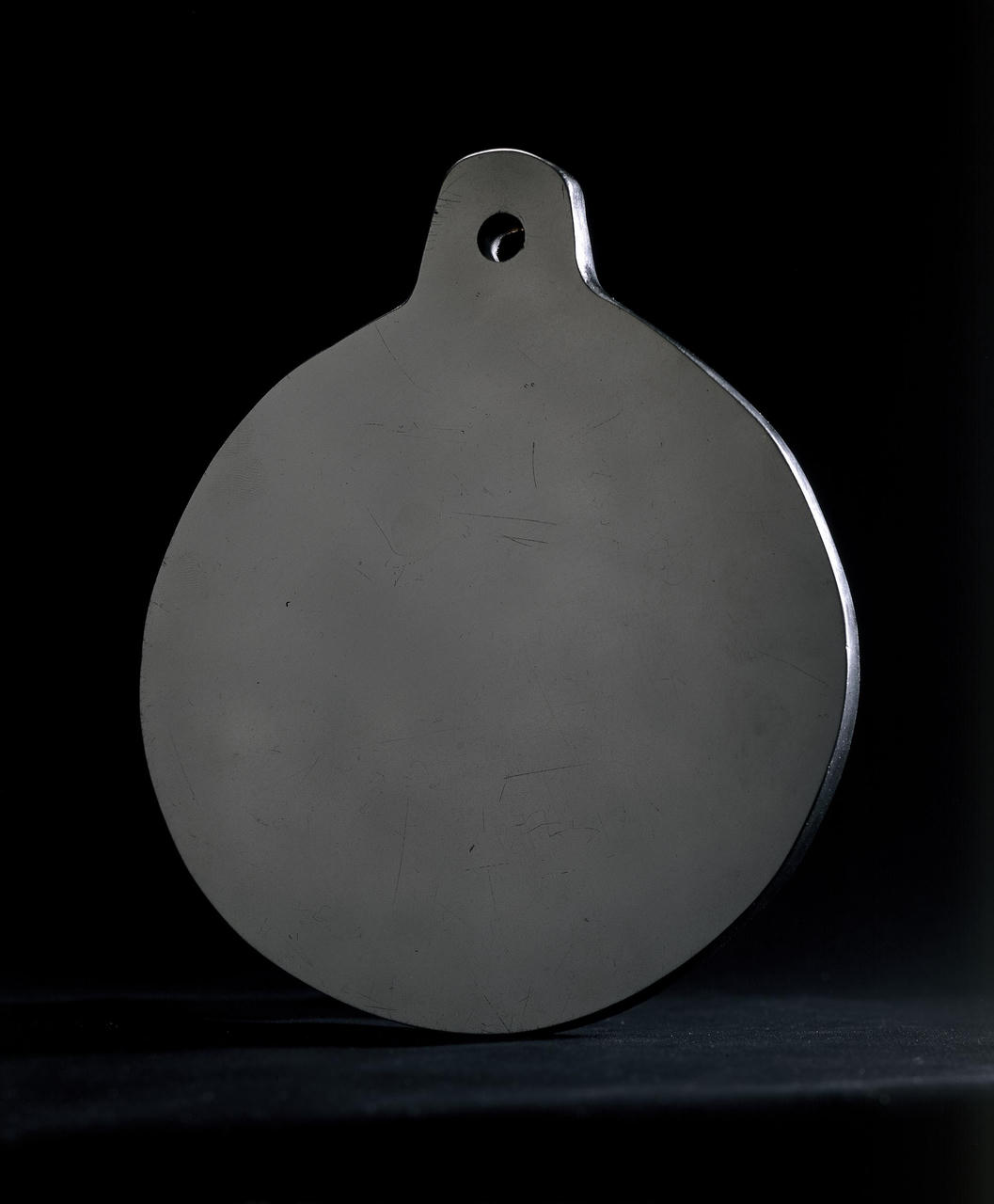 Dr. John Dee's obsidian scrying mirror, acq circa 1582, origin Mexico. Courtesy of The British Museum.